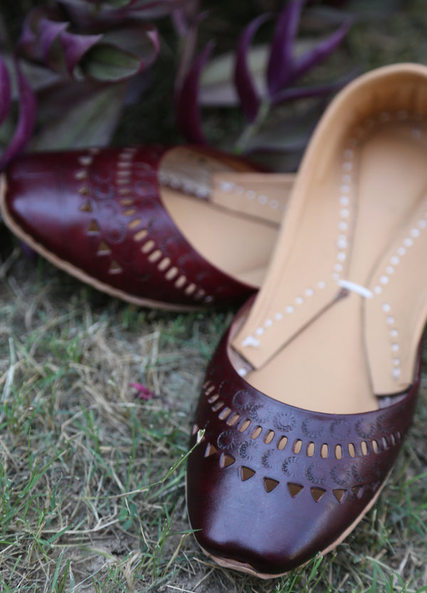 Maroon cutwork leather